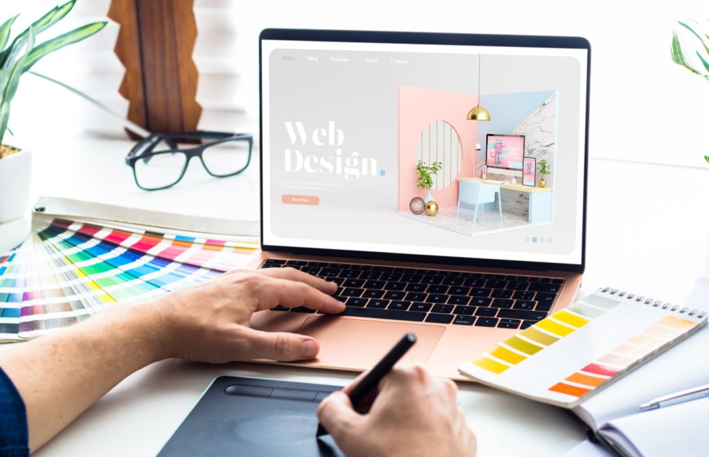 Web design desktop with  laptop and tools